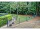 Enclosed dog park area perfect for pet owners, featuring lush greenery and secure fencing for safe play at 3999 Bayside Cir, Doraville, GA 30340