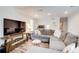 Open-concept living room with sleek furnishings and natural light perfect for entertaining and relaxing at 3999 Bayside Cir, Doraville, GA 30340