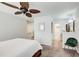 Bedroom featuring wooden furniture, a ceiling fan, and a calming atmosphere at 3999 Bayside Cir, Doraville, GA 30340
