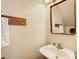 Cozy half bathroom with a vessel sink and decorative mirror at 3999 Bayside Cir, Doraville, GA 30340