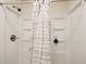 Clean and functional shower stall with white tile and built-in shelving at 3999 Bayside Cir, Doraville, GA 30340