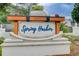 Community entrance sign for Spring Harbor with decorative details, adding a touch of elegance and branding at 3999 Bayside Cir, Doraville, GA 30340