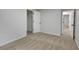 Bright bedroom with neutral walls, carpeting and large walk-in closet at 4009 Riverstone Dr, Suwanee, GA 30024