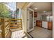 View from the back porch into the house, showing the kitchen and dining room at 6991 Flagstone Dr, Austell, GA 30168
