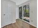 Bright bedroom with hardwood floors, closet, and sliding glass doors to a deck at 6991 Flagstone Dr, Austell, GA 30168
