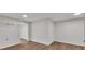 Large bonus room with new flooring, neutral walls, and closet storage at 6991 Flagstone Dr, Austell, GA 30168