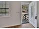 Inviting entryway featuring a decorative door and a view of the front porch at 6991 Flagstone Dr, Austell, GA 30168