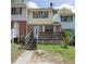 Charming townhome with a brick facade and a cozy front deck at 6991 Flagstone Dr, Austell, GA 30168