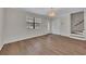 Inviting living room boasting hardwood floors and natural lighting at 6991 Flagstone Dr, Austell, GA 30168