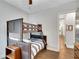 Another view of the comfortable bedroom featuring a bunk bed, dresser, and natural light, perfect for or guests at 219 Cordova St, Woodstock, GA 30189