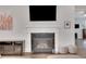 Living room featuring a modern fireplace, media center, and neutral color palette at 219 Cordova St, Woodstock, GA 30189