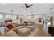 Bright and spacious living area with a modern kitchen and dining area, perfect for entertaining at 219 Cordova St, Woodstock, GA 30189
