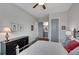 Cozy main bedroom showcasing a black dresser and ensuite bathroom entrance, creating a relaxing retreat at 219 Cordova St, Woodstock, GA 30189
