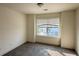 Bright bedroom with natural light, plush carpet and view of the community at 32 S Auburn Landing Pl, Auburn, GA 30011