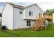 Exterior featuring a multi-level deck in the backyard with green lawn at 4527 Berline Dr, Lithonia, GA 30038