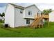 Exterior featuring a multi-level deck in the backyard with green lawn at 4527 Berline Dr, Lithonia, GA 30038
