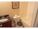 Bathroom showcasing a sink with vanity, toilet, and bathtub with shower features at 4527 Berline Dr, Lithonia, GA 30038