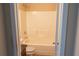 Bathroom features a shower-tub combo and a single sink with granite countertop at 4527 Berline Dr, Lithonia, GA 30038