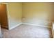 Cozy carpeted bedroom features neutral paint, offering a comfortable and versatile space at 4527 Berline Dr, Lithonia, GA 30038