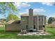 Large backyard with patio, grill, and basketball hoop at 4147 Pinehurst Valley Dr, Decatur, GA 30034