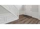 Close-up view of entryway with luxury vinyl plank flooring, white trim, and entry door at 4147 Pinehurst Valley Dr, Decatur, GA 30034