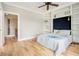 Bedroom featuring light hardwood floors and built in bookcases at 587 Virginia Ne Ave # 609, Atlanta, GA 30306