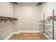 Walk-in closet with custom shelving and wood flooring at 587 Virginia Ne Ave # 609, Atlanta, GA 30306