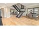 Open floor plan with dining area, sleek staircase, and plenty of natural light at 587 Virginia Ne Ave # 609, Atlanta, GA 30306