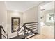 Hallway with hardwood floors, artwork, and access to the bedrooms at 587 Virginia Ne Ave # 609, Atlanta, GA 30306