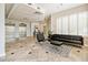 Lobby area featuring travertine tile, mirrored ceiling and seating area at 587 Virginia Ne Ave # 609, Atlanta, GA 30306