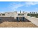 Enjoy the skyline view from the rooftop patio with outdoor seating and a gravel accent at 587 Virginia Ne Ave # 609, Atlanta, GA 30306