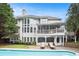 Large backyard with swimming pool, patio, and deck that is perfect for entertaining guests at 650 Garden Wilde Place, Roswell, GA 30075