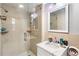 This bathroom features a glass-door shower, tiled walls, and sleek fixtures, combining style and functionality at 6628 Londonderry Dr, Morrow, GA 30260
