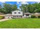 Charming two-story home featuring a lush front lawn and attached garage at 6628 Londonderry Dr, Morrow, GA 30260
