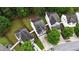 Aerial view showcasing homes with green trees and landscaped yards at 176 Silver Fox Trl, Dallas, GA 30157
