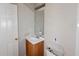 Bathroom featuring a mirror, vanity, and toilet at 176 Silver Fox Trl, Dallas, GA 30157