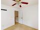 Bedroom features a ceiling fan with lighting fixture, a doorway, and white walls at 176 Silver Fox Trl, Dallas, GA 30157