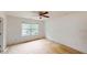 A standard bedroom with a ceiling fan and a window at 176 Silver Fox Trl, Dallas, GA 30157