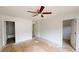 A standard bedroom with multiple entries and white walls at 176 Silver Fox Trl, Dallas, GA 30157