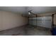 A standard two car garage with garage door openers and concrete floor at 176 Silver Fox Trl, Dallas, GA 30157