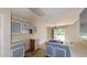 Features a double basin sink and access to the backyard through a sliding glass door at 176 Silver Fox Trl, Dallas, GA 30157
