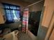 Bathroom featuring a tub with colored shower curtain, sink, and window at 301 Sisson Ne Ave, Atlanta, GA 30317