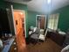 Bedroom features wood floor, closet, and window at 301 Sisson Ne Ave, Atlanta, GA 30317