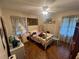 Bedroom featuring bed with matching furnishings and a window at 301 Sisson Ne Ave, Atlanta, GA 30317