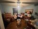 Bedroom has wood floor, ceiling fan, one window and several furnishings at 301 Sisson Ne Ave, Atlanta, GA 30317