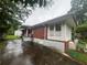Brick home with a private driveway and small, fenced backyard at 301 Sisson Ne Ave, Atlanta, GA 30317
