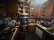 Traditional kitchen features dark wood cabinets and stainless steel double oven at 301 Sisson Ne Ave, Atlanta, GA 30317
