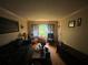 Cozy living room with a large window and comfortable seating at 301 Sisson Ne Ave, Atlanta, GA 30317