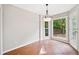 Breakfast nook with backyard views and modern lighting fixture at 4780 Agate Dr, Johns Creek, GA 30022