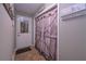 Entryway with decorative closet doors and convenient coat hooks, blending style with functionality at 8321 Banks Mill Rd, Douglasville, GA 30135